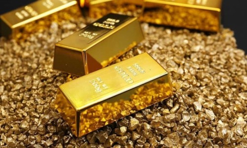 Giá vàng giảm nhẹ trước sức ép của USD