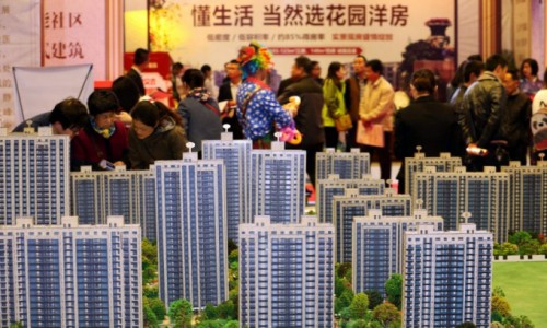 Ngành bất động sản Trung Quốc vật vã bán tháo tài sản